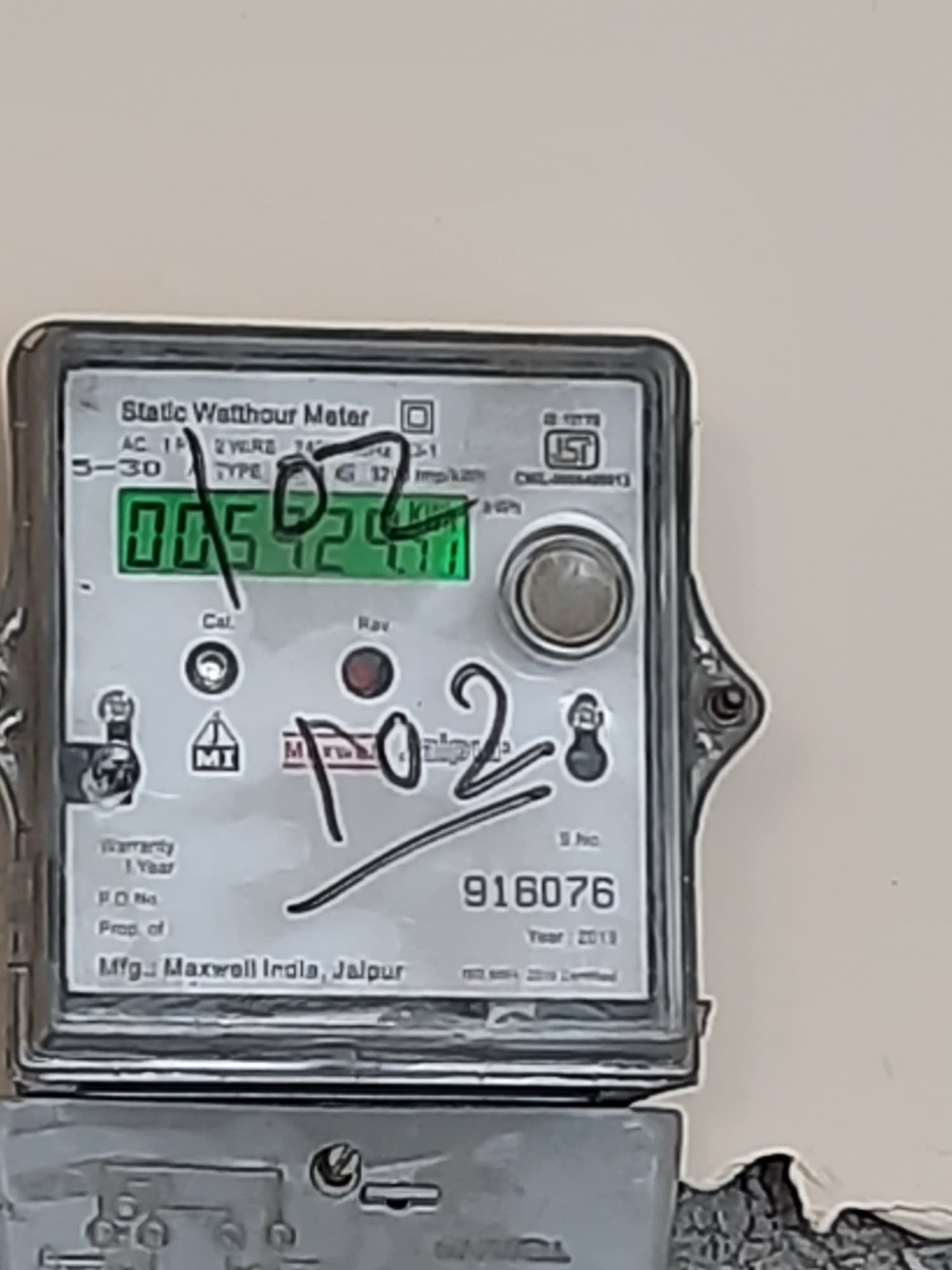 A single-phase static meter, made in Jaipur, on the wall of an Indian home; a net meter looks the same but keeps two registers